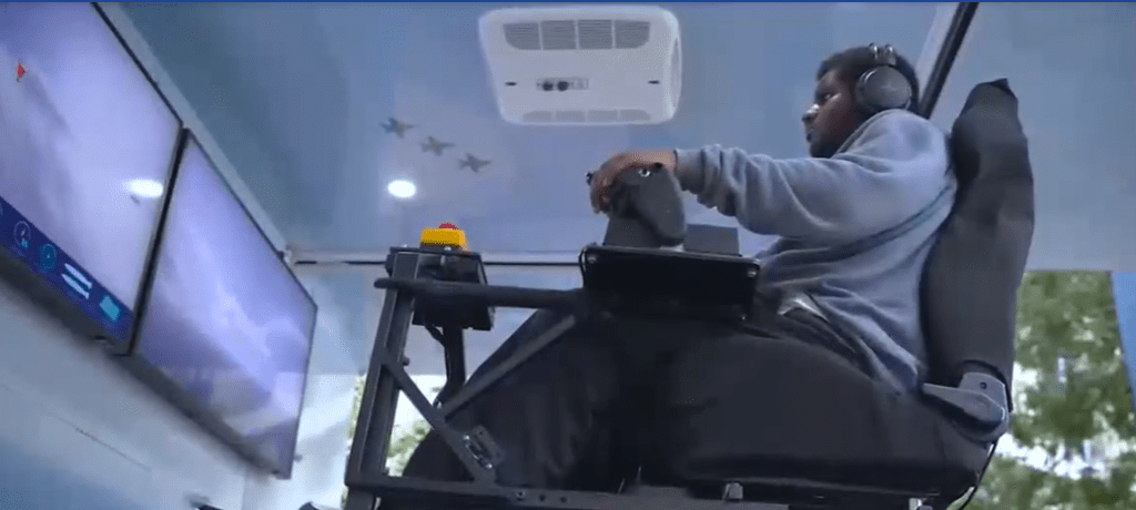 boy on flight simulator